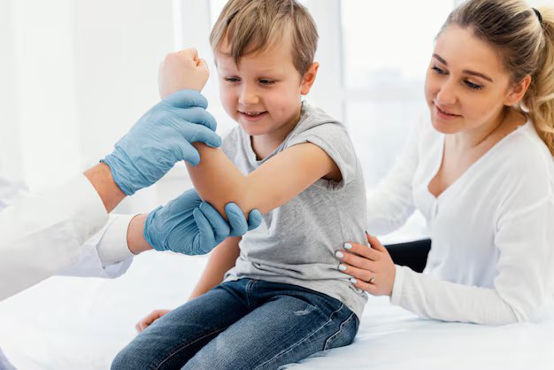 Pediatric Orthopedist examining a child's leg after injury at Srinidhi Heart & Child Clinics in Kukatpally, Hyderabad
