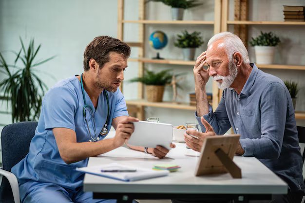 Doctor advising an adult patient about the right time for a heart health screening